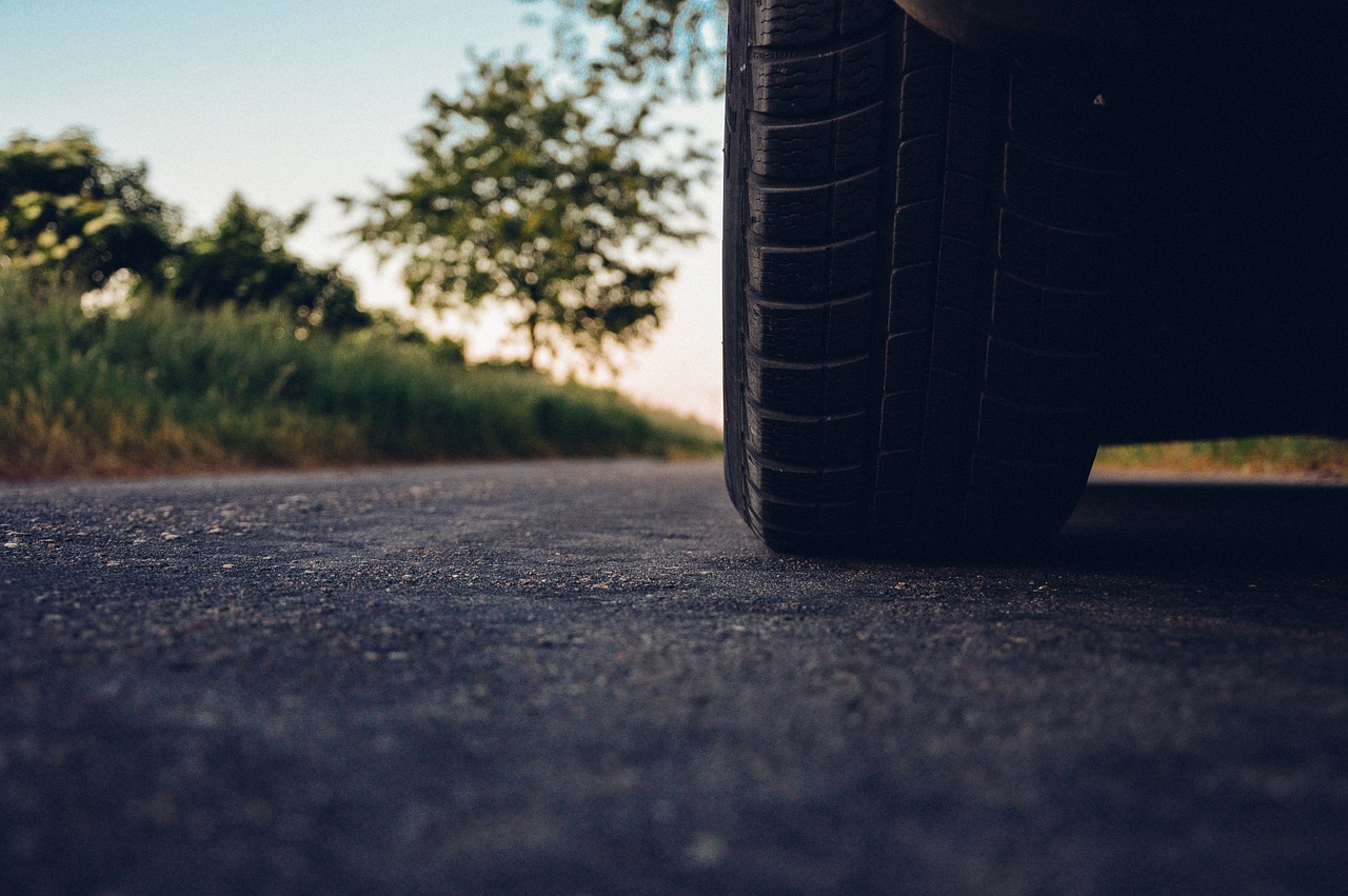 A car tire on the pavement